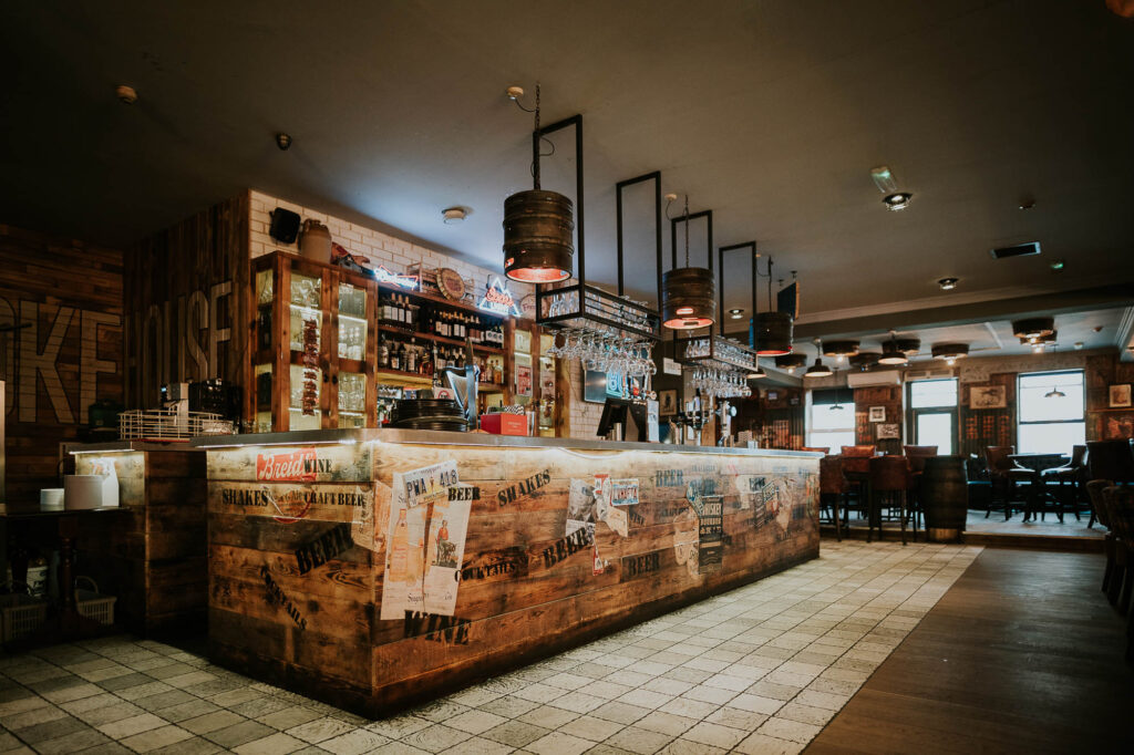 Sports bar screens inside Smokey Barrels